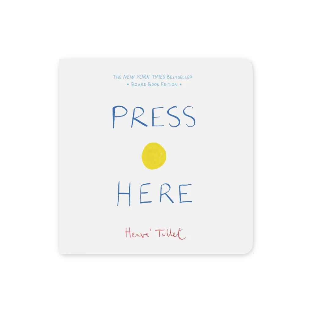 Okładka książki Press Here Board Book Edition z żółtą kropką