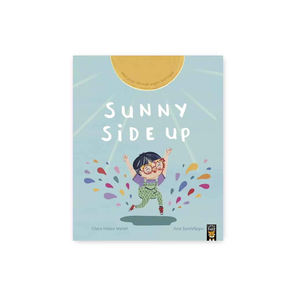 Okładka książki Sunny Side Up z dzieckiem w okularach, które skacze radośnie pod słońcem i kolorowymi promieniami