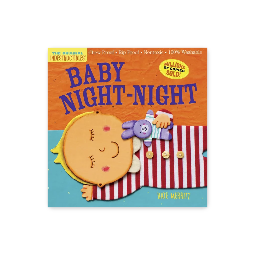 Okładka książki „Baby Night-Night” z serii Indestructibles – dziecko w piżamie śpi z maskotką na pomarańczowym tle