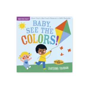 Okładka książki „Baby, See the Colors!” z serii Indestructibles – dziecko z latawcem, kolorowe litery i ilustracje dla niemowląt
