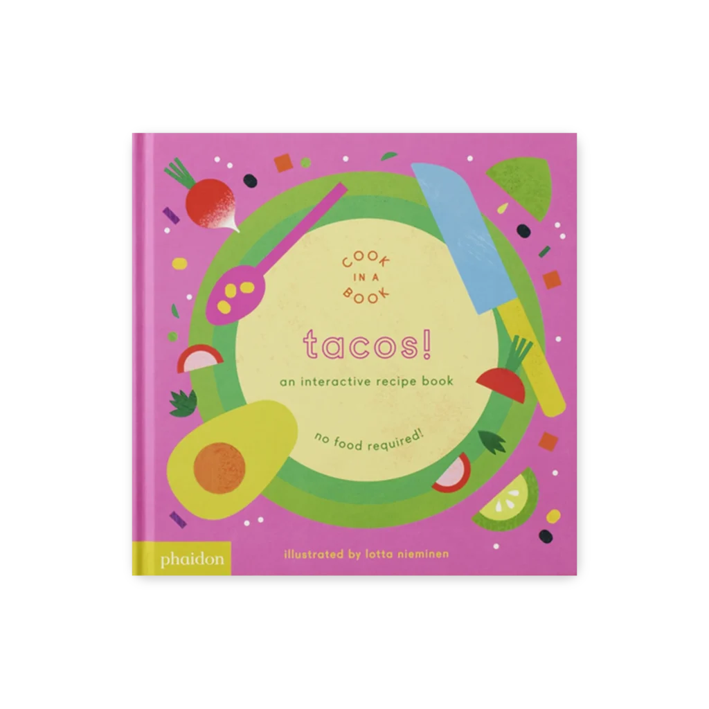 Okładka książki dla dzieci „Tacos! An Interactive Recipe Book” z kolorowymi grafikami warzyw, awokado, noża i łyżki na fioletowym tle