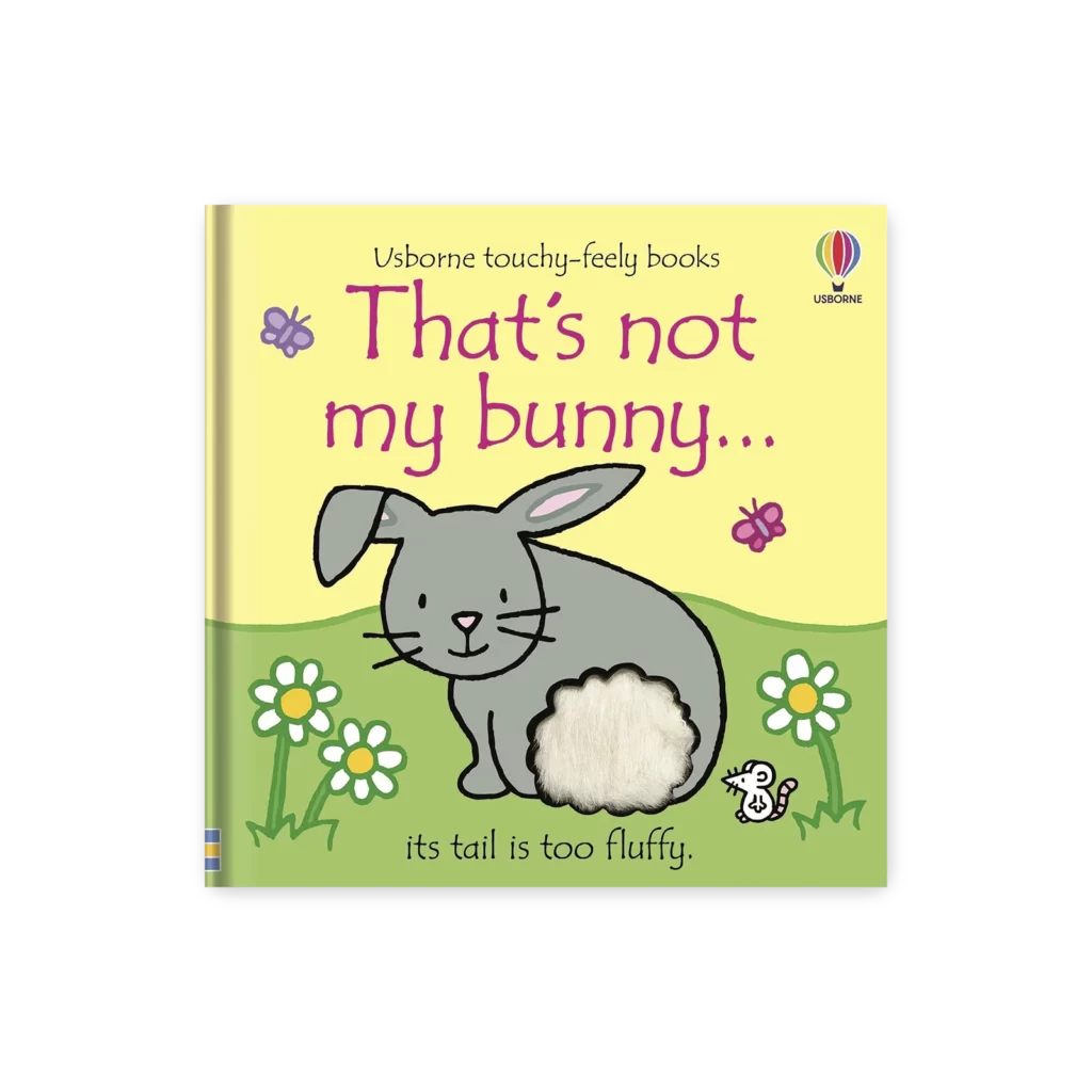 Okładka książki “That’s Not My Bunny” z serii książek sensorycznych, przedstawiająca króliczka z puszystym ogonkiem.